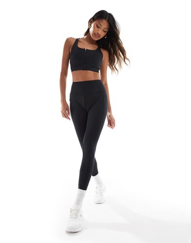 Icon - Leggings da palestra e da corsa allacciati in vita neri con tasca per il telefono - ASOS - Modalova