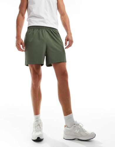 Icon - Pantaloncini da allenamento quick dry da 5" kaki con tasche con zip - ASOS - Modalova