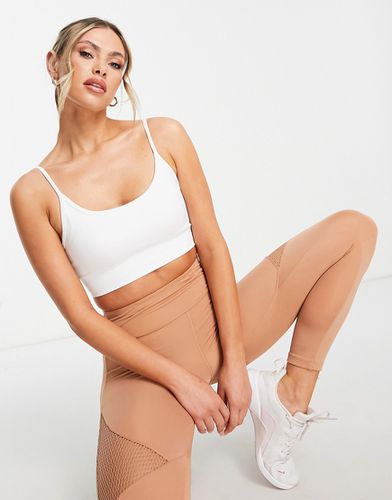 Icon - Reggiseno sportivo a supporto leggero senza cuciture con imbottitura rimovibile - ASOS - Modalova