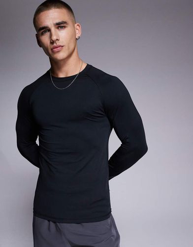 Icon - Top base layer a maniche lunghe da allenamento attillato accollato - ASOS - Modalova