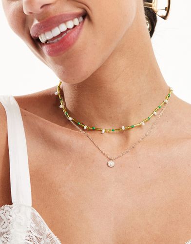 Confezione da 2 collane con perline verdi e ciondolo a disco - ASOS DESIGN - Modalova
