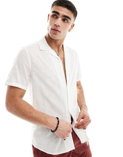 Camicia vestibilità classica effetto lino bianca con maniche con risvolto e colletto con rever - ASOS DESIGN - Modalova