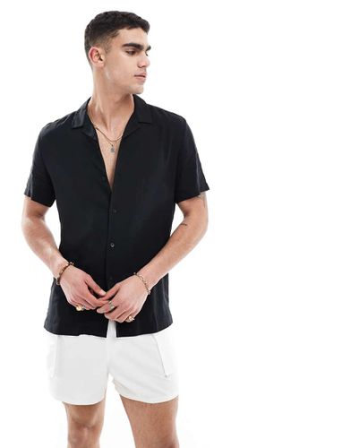 Camicia vestibilità classica in viscosa nera con rever - ASOS DESIGN - Modalova