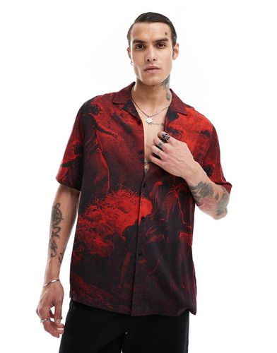 Camicia comoda con rever rossa con stampa halloween - ASOS DESIGN - Modalova