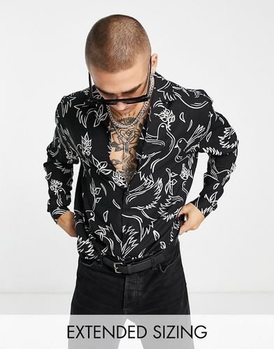 Camicia comoda nera con stampa di uccelli e rever - ASOS DESIGN - Modalova