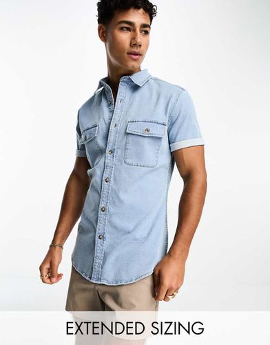 Camicia skinny a maniche corte in denim lavaggio azzurro - ASOS DESIGN - Modalova