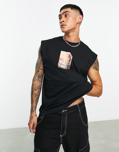 Canotta oversize nera con stampa di spiaggia sul petto - ASOS DESIGN - Modalova