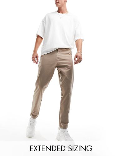 Chino affusolati color pietra - ASOS DESIGN - Modalova