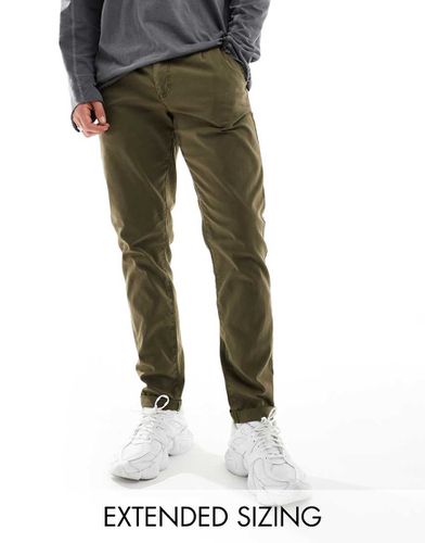 Chino slim kaki scuro slavato - ASOS DESIGN - Modalova