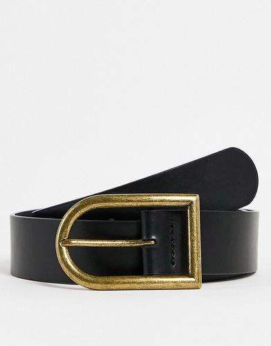 Cintura in pelle sintetica larga nera con fibbia oro asimmetrica - ASOS DESIGN - Modalova