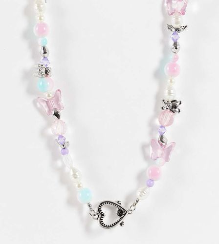 ASOS DESIGN Curve - Collana di perline con charms graziosi e barretta a T con cuore color argento - ASOS Curve - Modalova