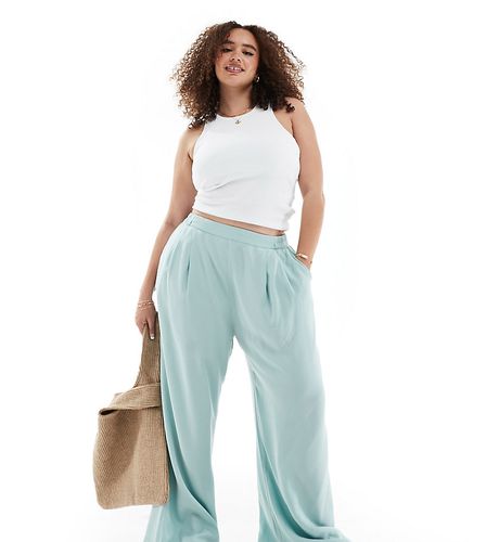 Curve - Pantaloni con fondo ampio azzurri - ASOS DESIGN - Modalova