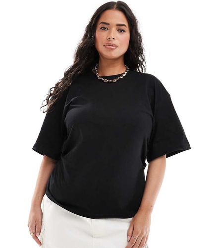 ASOS DESIGN Curve - T-shirt nera con vita a corsetto - ASOS Curve - Modalova