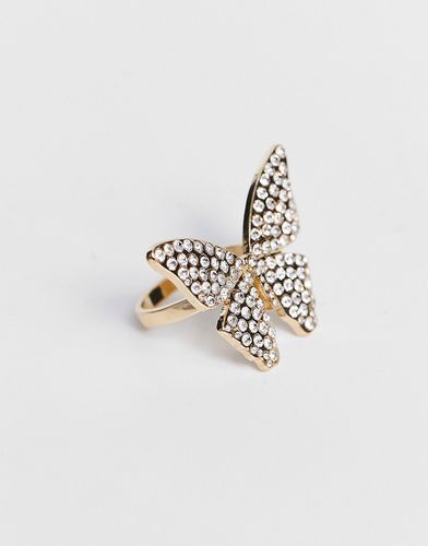 Anello fashion dorato a forma di farfalla con pavé - ASOS DESIGN - Modalova