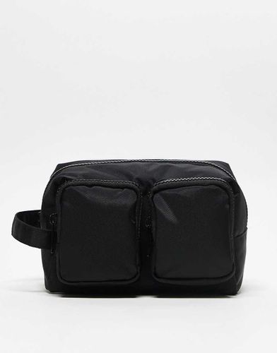 Beauty-case con tasche sul davanti - ASOS DESIGN - Modalova