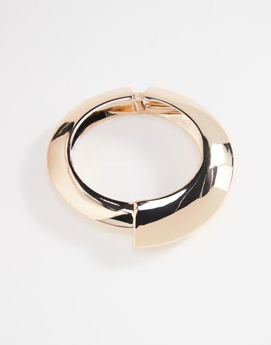 Bracciale rigido dorato con dettagli astratti - ASOS DESIGN - Modalova