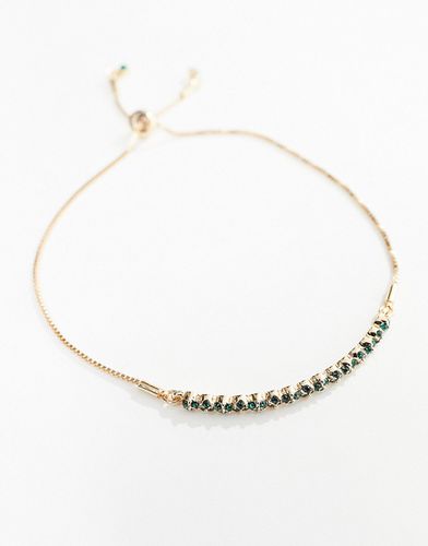 Braccialetto dell'amicizia rigido color con cristalli e pietre color smeraldo - ASOS DESIGN - Modalova