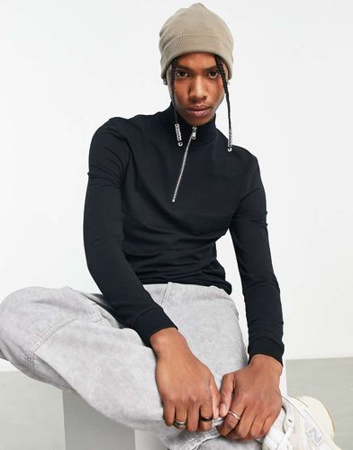 Felpa attillata nera con zip corta - ASOS DESIGN - Modalova