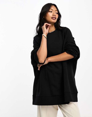 Felpa nera oversize con dettagli raglan - ASOS DESIGN - Modalova