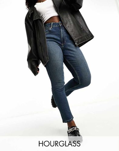 Hourglass - Mom jeans confortevoli slim lavaggio scuro vintage - ASOS DESIGN - Modalova