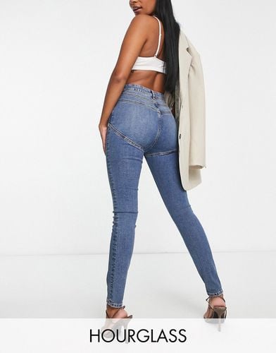 Hourglass - Jeans skinny modellanti elasticizzati scuro - ASOS DESIGN - Modalova
