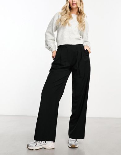 Hourglass - Pantaloni sartoriali a fondo ampio neri - ASOS DESIGN - Modalova