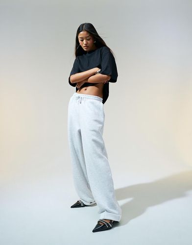 Joggers oversize mélange con dettaglio risvoltato - ASOS DESIGN - Modalova