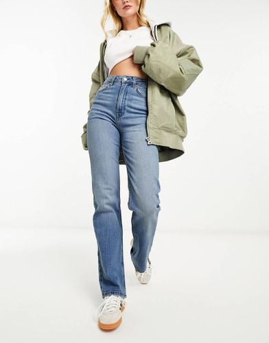 Jeans comfort stretch dritti lavaggio medio - ASOS DESIGN - Modalova