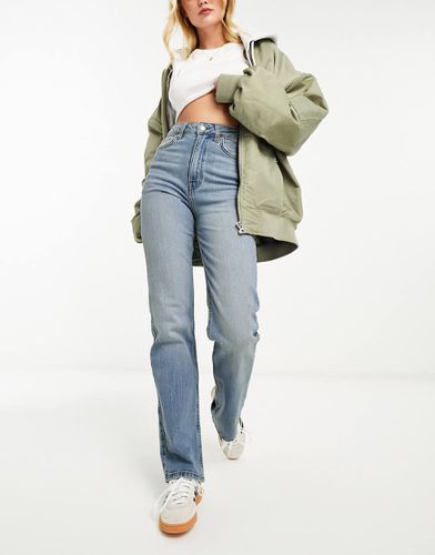 Jeans comfort stretch dritti lavaggio medio - ASOS DESIGN - Modalova