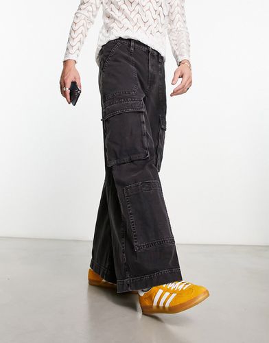 Jeans cargo a fondo super ampio nero slavato - ASOS DESIGN - Modalova