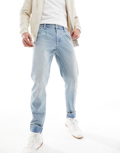 Jeans classici rigidi medio con pieghe e risvolto - ASOS DESIGN - Modalova