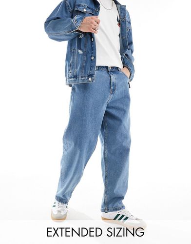Jeans a cilindro lavaggio chiaro - ASOS DESIGN - Modalova