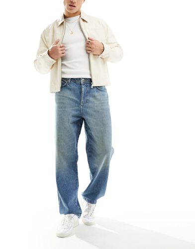 Jeans ampi lavaggio chiaro - ASOS DESIGN - Modalova