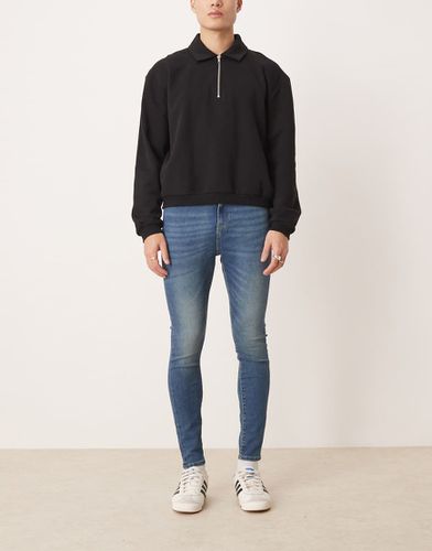 Jeans power stretch lavaggio scuro - ASOS DESIGN - Modalova