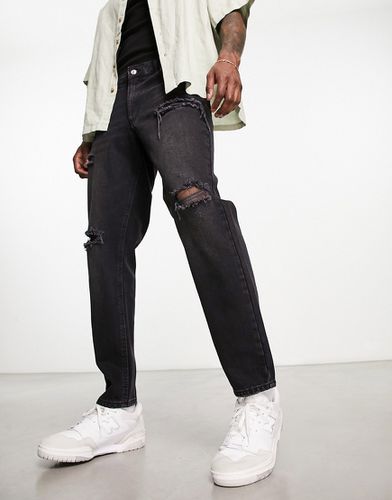 Jeans rigidi classici lavaggio con strappi - ASOS DESIGN - Modalova