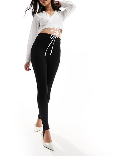 Leggings neri con staffe - ASOS DESIGN - Modalova