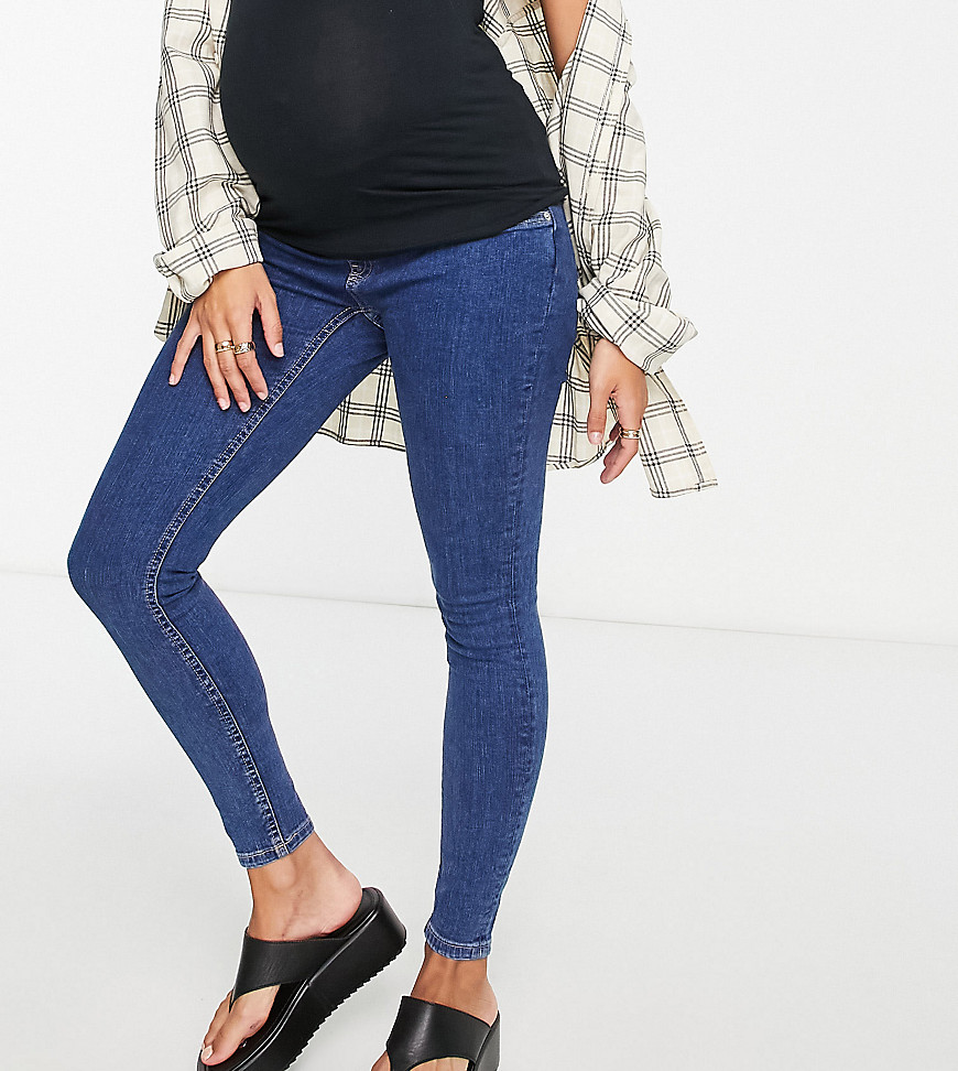 ASOS DESIGN Maternity - Jeans skinny a vita alta con fascia sotto il pancione medio - ASOS Maternity - Modalova