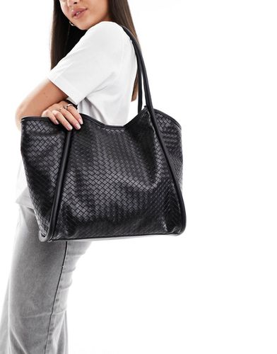 Maxi borsa nera intrecciata con dettagli tubolari - ASOS DESIGN - Modalova