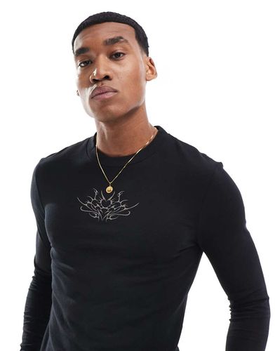 Maglia a maniche lunghe attillata nera con stampa di tatuaggio sul davanti - ASOS DESIGN - Modalova