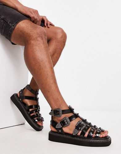 Sandali gladiatore in pelle neri con dettagli stile western e suola spessa - ASOS DESIGN - Modalova