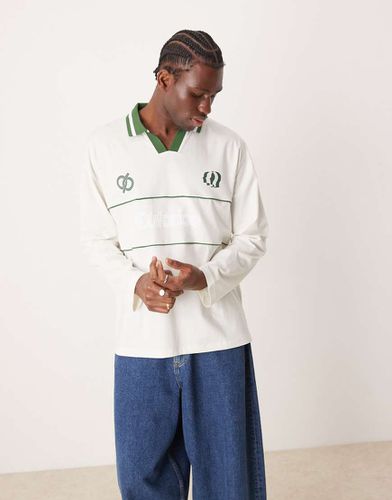 Polo oversize a maniche lunghe color crema con grafica sportiva - ASOS DESIGN - Modalova