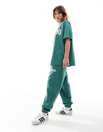 Pantalon de jogging resserré aux chevilles avec motif Colorado - Asos Design - Modalova