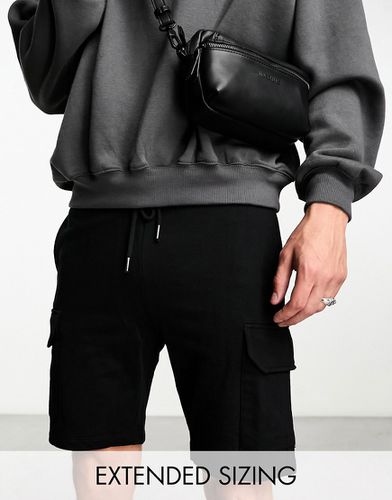 Pantaloncini neri in jersey con tasche cargo - ASOS DESIGN - Modalova