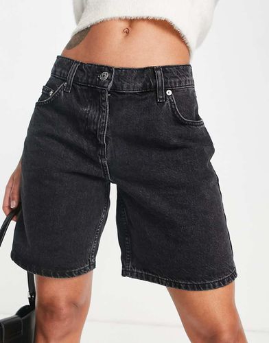 Pantaloncini boyfriend ampi a vita bassa slavato - ASOS DESIGN - Modalova