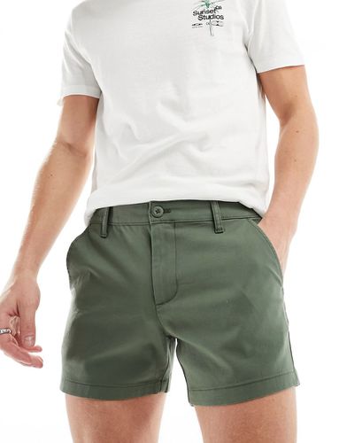 Pantaloncini chino skinny taglio corto color kaki - ASOS DESIGN - Modalova