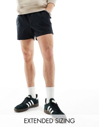 Pantaloncini chino slim taglio corto neri con vita elasticizzata - ASOS DESIGN - Modalova
