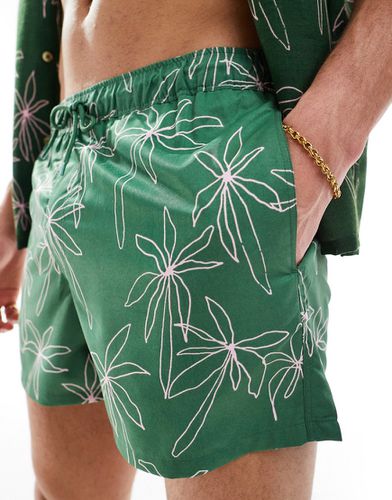 Pantaloncini da bagno taglio medio verdi con stampa stilizzata di palme - ASOS DESIGN - Modalova