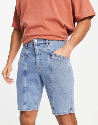 Pantaloncini dad di jeans lavaggio chiaro con pannello sul davanti - ASOS DESIGN - Modalova