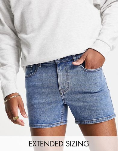 Pantaloncini di jeans corti skinny lavaggio scuro - ASOS DESIGN - Modalova