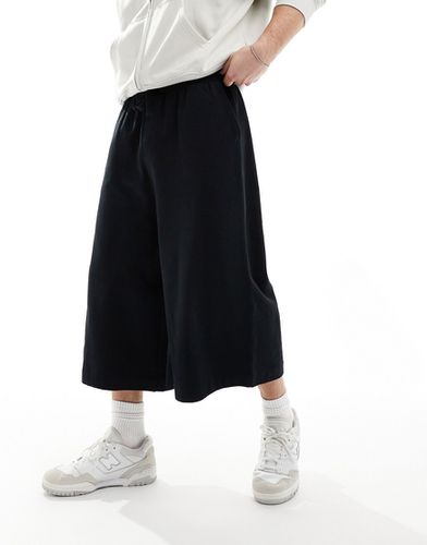 Pantaloncini pesanti taglio super lungo neri - ASOS DESIGN - Modalova